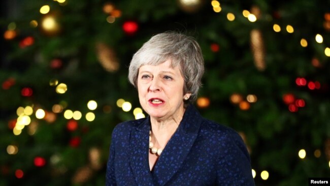 英国首相特蕾莎·梅在不信任投票举行后发表讲话。（2018年12月12日）