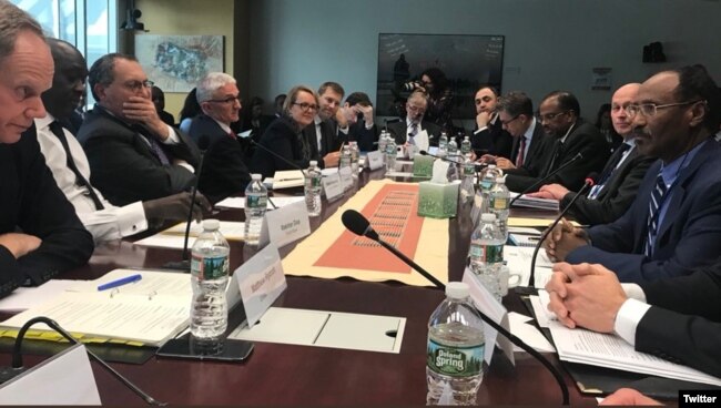Somali Finance Minister Abdirahman Duale Beileh (right) is seen with participants of International Monetary Fund (IMF) and World Bank meetings last week in Washington. (Twitter - @DrBeileh)