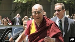 The Dalai Lama arrives in Washington, Tuesday, July 5, 2011