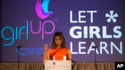 FILE - First lady Michelle Obama is seen speaking at the United Nations Foundation's Girl Up Leadership Summit, Tuesday, July 14, 2015, at the W Hotel in Washington. 