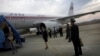 북한 평양순안국제공항에서 고려항공 여객기 탑승객들이 내리고 있다. (자료사진)