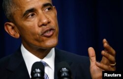 FILE - Then-President Barack Obama speaks in Washington at the White House Summit on Countering Violent Extremism, Feb. 18, 2015.