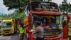 Ilustrasi - Petugas memeriksa bus pada hari pertama larangan mudik lewat laut, darat, udara, dan kereta api menjelang lebaran, dalam upaya mencegah penularan COVID-19, 6 Mei 2021, (Antara Foto / Adeng Bustomi / via Reuters.)