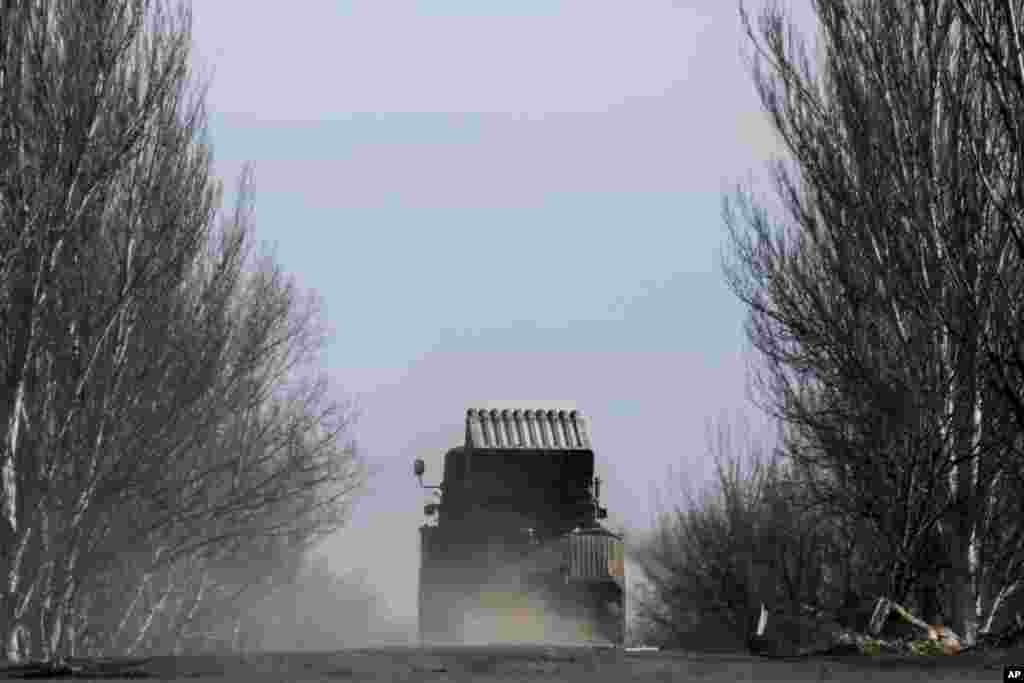 A Ukrainian multiple rocket launcher is transported towards near Artemivsk, eastern Ukraine, Feb. 23, 2015.