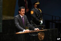 FILE - Sheikh Tamim bin Hamad al-Thani, emir of Qatar, addresses the 76th Session of the UN General Assembly at United Nations headquarters in New York, on Sept. 21, 2021.