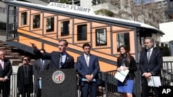 Los Angeles Mayor Eric Garcetti speaks at news conference standing in front of the Angels Flight railway in Los Angeles, California, March 1, 2017.