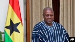 FILE - President of Ghana John Dramani Mahama is seen during a visit to New Delhi, India, Oct. 28, 2015. His critics say he is making his usual list of largely empty promises ahead December 7 election in his country.