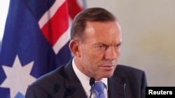 FILE - Australian Prime Minister Tony Abbott speaks at a news conference.