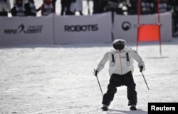 A robot takes part in the Ski Robot Challenge at the Welli Hilli ski resort in Hoenseong, South Korea, February 12, 2018. REUTERS/Kim Hong-Ji