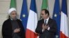 حسن روحانی رئیس جمهوری ایران و فرانسوا اولاند رئیس جمهوری فرانسه در کاخ الیزه در پاریس