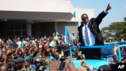 Malawi President Peter Mutharika has pledged economic reforms. He’s shown after being sworn into office in Blantyre on May 31, 2014.