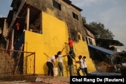 A slum in Asalpha, in Mumbai's eastern suburbs, got a colorful makeover through a charity initiative aimed at brightening slums, home to more than half the city's population.