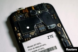 The inside of a ZTE smart phone is pictured in this illustration taken April 17, 2018.