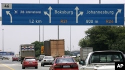 FILE - Traffic in Johannesburg.