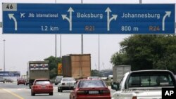 FILE - A current road sign which directs traffic in Johannesburg.