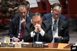 U.S. Secretary of State Mike Pompeo listens during a Security Council meeting on Iran's compliance with the 2015 nuclear agreement at United Nations headquarters, Dec. 12, 2018.