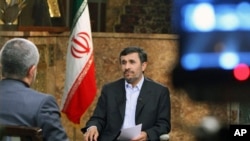 Iranian President Mahmoud Ahmadinejad speaks with state television about Iran's nuclear ambitions during a live program in Tehran, Dec 18, 2010
