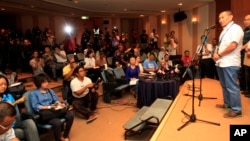 Tổng Giám đốc Malaysia Airlines, Ahmad Jauhari Yahyain, phát biểu trong 1 cuộc họp báo tại 1 khách sạn ở Sepang, bên ngoài Kuala Lumpur, Malaysia, 8/3/2014