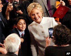 Hillary Clinton poses for a photo after debate.