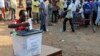 FILE - A man casts his vote at a polling station during presidential elections in Accra, Dec. 7, 2012. Presidential candidate Hassan Ayariga says he is confident Ghanaians embrace his plans to transform the lives of citizens across the country.
