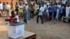 FILE - A man casts his vote at a polling station during presidential elections in Accra, Ghana, Dec. 7, 2012. 