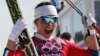 Vận động viên Marit Bjoergen của Na Uy vui mừng sau khi giành chiến thắng ở môn trượt tuyết băng đồng nữ 30 km xuất phát tập thể, ngày 22 tháng 2, 2014.