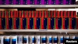 Anti-retroviral (ARV) drugs sit on a shelf in the pharmacy at the Ubuntu clinic in Cape Town's Khayelitsha township, Feb. 15, 2010. 