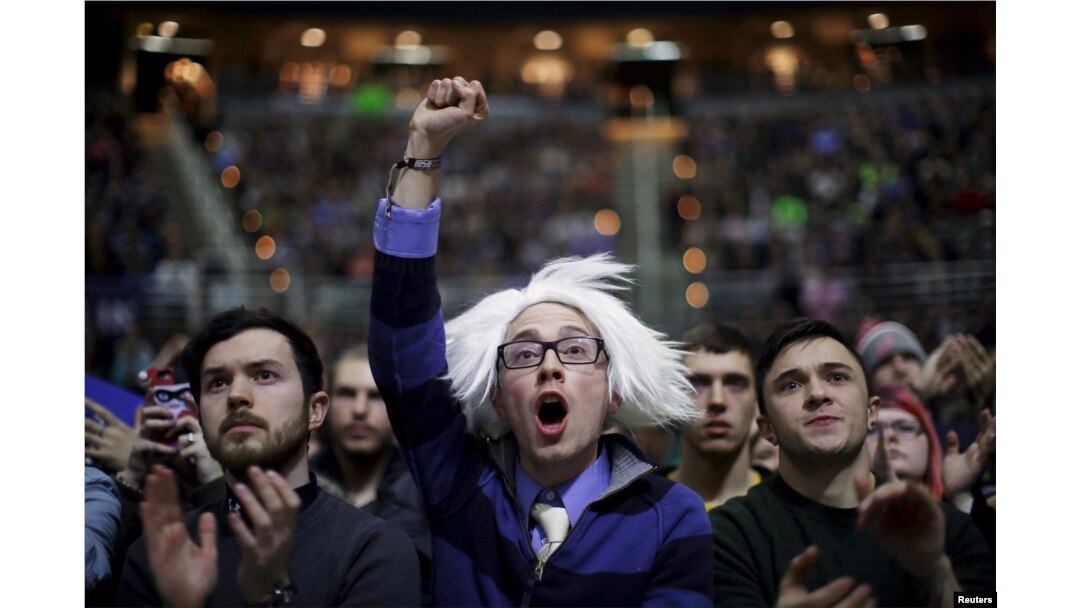 Supporters cheer at a campaign rally for U.S. Democratic presidential candidate Bernie Sanders in East Lansing, Michigan, March 2, 2016.