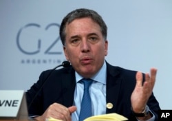 Argentina's Treasury Minister Nicolas Dujovne speaks during a news conference at the World Bank-IMF spring meetings, in Washington, April 20, 2018.