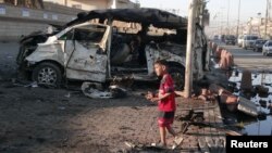 Последствия взрыва в Садр-Сити, Багдад. Ирак, 28 октября 2012 года
