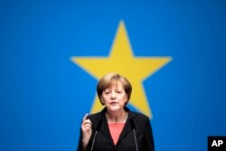 Kanselir Jerman, Angela Merkel, menyampaikan pidatonya dalam konvensi Partai Persatuan Demokrasi Kristen yang berkuasa, menjelang pemilu anggota parlemen Eropa di Berlin, 5 April 2014.