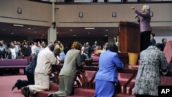 Only a generation ago, parishioners were flocking to so-called megachurches with congregations that numbered in the thousands. Rev. Jo Ann Browning (TOP R) leads one of America's largest congregations at Ebenezer AME Church in Fort Washington, Maryland in