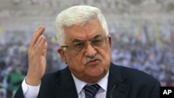 Ketua faksi Fatah, Presiden Palestina Mahmoud Abbas ikut memberikan sambutan bagi rapat umum di Gaza dari Ramallah, Jumat 4/1 (foto: dok). 