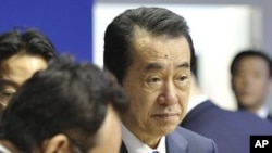 Japanese Prime Minister Naoto Kan, right, participates in a meeting at the G8 summit in Deauville, France, Thursday, May 26, 2011