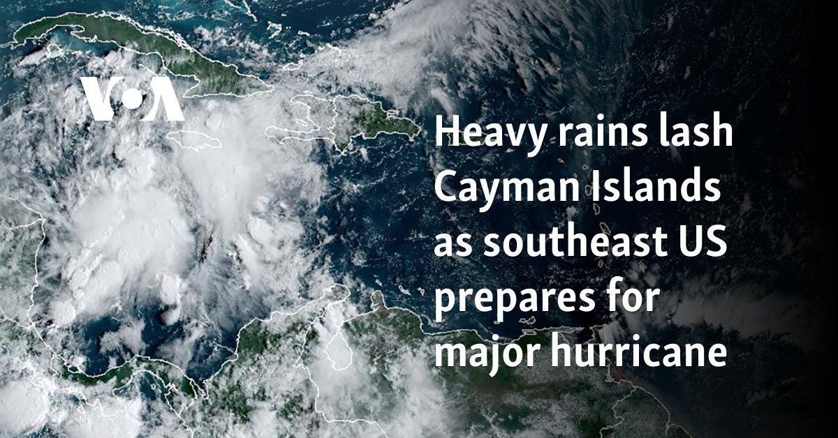 Heavy rains lash Cayman Islands as southeast US prepares for major hurricane 