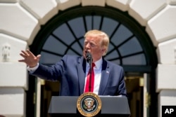 President Donald Trump speaks during a Made in America showcase on the South Lawn of the White House in Washington, Monday, July 15, 2019. (AP Photo/Andrew Harnik)