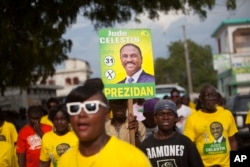 Supporters of presidential candidate Jude Celestin arrive to his campaign rally in Croix-des-Bouquets, Haiti, Sept. 27, 2015.