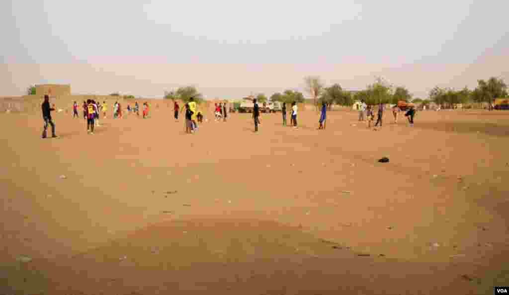 Citizens playing soccer, which is forbidden in the country. (Idriss Fall/VOA)