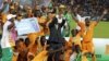 Ivory Coast players celebrate with the trophy after winning their African Football Cup of Nations final against Ghana in Bata, Equatorial Guinea, Feb. 8, 2015. The tournament returns to Gabon for the second time in five years beginning Jan. 14, 2017.
