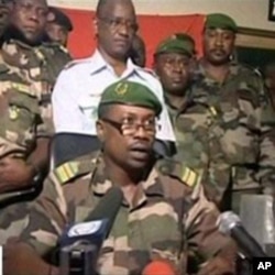 TV frame grab shows Colonel Gokoye Abdul Karimou, spokesman for the Niger millitary junta delivering a televised statement in Niamey, 19 Feb 2010