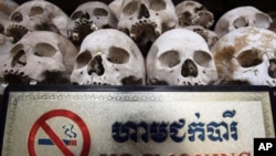 Human sculls are displayed in the stupa of Choeung Ek, a former Khmer Rouge "killing field" dotted with mass graves about nine miles (15 kilometers) south of Phnom Penh.