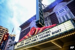 Cast and crew members arrive at the premiere of "Everybody Wants Some" at the Paramount Theatre during South By Southwest, March 11, 2016, in Austin, Texas.