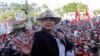 Xiomara Castro, candidata presidencial del opositor Partido Libre, se dirige a sus simpatizantes durante el acto de clausura de su campaña electoral en San Pedro Sula, Honduras, el 20 de noviembre de 2021. REUTERS / Yoseph Amaya / Foto de archivo