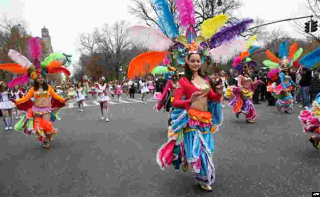 Mmebers of Banda Musical Latina Pedro Molina of Guatemala perform during the Macy's Thanksgiving Day Parade in New York Thursday, Nov. 25, 2010. (AP Photo/Craig Ruttle)