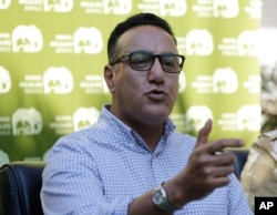 Cabinet Secretary for Tourism Najib Balala speaks to journalists in Nairobi, Kenya, July 17, 2018, after he visited the Tsavo east national park, after the death of eight black rhinos which were moved to Tsavo East National Park.