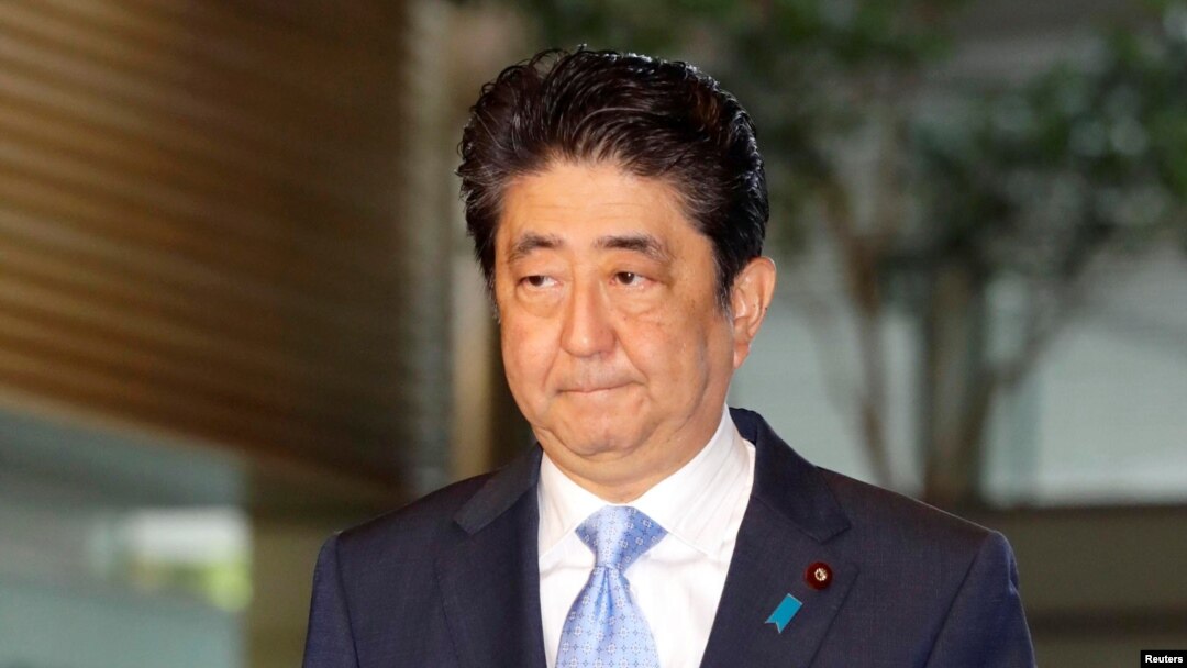 Japan's Prime Minister Shinzo Abe arrives at his official residence in Tokyo, Japan, in this photo taken by Kyodo, May 14, 2017, after South Korea's military said that North Korean had fired an unidentified projectile from a region near its west coast.