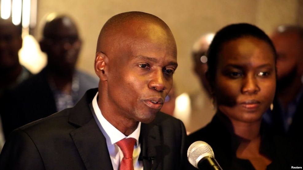 Jovenel Moise addresses the media next to his wife, Martine, after winning the November 20 presidential election in Port-au-Prince, Haiti, Nov. 28, 2016.