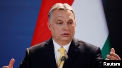 Hungarian Prime Minister Viktor Orban speaks during a press conference in Budapest, Hungary, April 10, 2018.