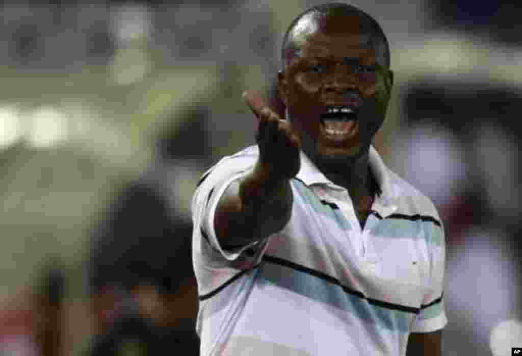 Senegal's coach Amara Traore reacts during their African Cup of Nations Group A soccer match against Libya at Estadio de Bata "Bata Stadium", in Bata January 29, 2012.