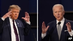 Trump i Biden tokom prve debate u Klivlendu